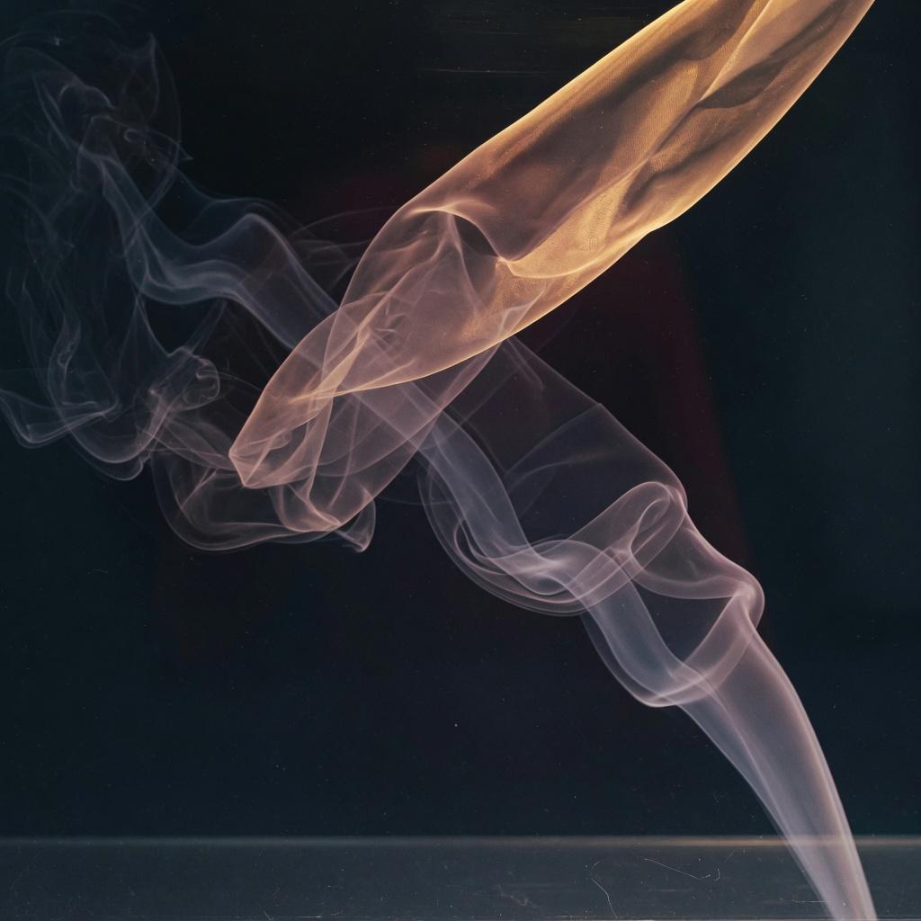 A thin veil of smoke folding through near-black space